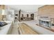 Bright and spacious living area featuring a brick fireplace at 1930 Taft Dr, Lakewood, CO 80215