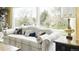 Bright living room featuring a large window offering a view of the outdoor scenery at 1930 Taft Dr, Lakewood, CO 80215