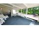 Enclosed patio featuring outdoor seating and a swing at 1930 Taft Dr, Lakewood, CO 80215
