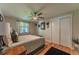 Bright bedroom with wood floors, a ceiling fan, and a cozy, inviting atmosphere at 2274 S Cherry St, Denver, CO 80222