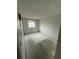 Neutral bedroom offering a window with blinds and a patterned accent wall at 4740 W 108Th Pl, Westminster, CO 80031