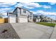 Street view of homes showcasing long driveways, well-kept lawns, and attractive exterior design at 3234 Belleville Ridge Rd, Elizabeth, CO 80107