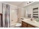 Standard bathroom with a shower-tub combination and single sink vanity at 8335 Fairmount Dr # 7-207, Denver, CO 80247