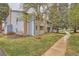View of the condos, showcasing well-maintained grounds and classic architectural details at 8335 Fairmount Dr # 7-207, Denver, CO 80247