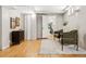 Finished basement living space with hardwood floors and modern decor at 2641 N Clayton St, Denver, CO 80205