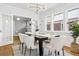 Bright dining room with hardwood floors and views of the outdoor area at 2641 N Clayton St, Denver, CO 80205