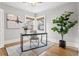 Cozy office space with natural light, hardwood floors, and neutral decor at 2641 N Clayton St, Denver, CO 80205