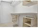 Organized walk-in closet featuring ample shelving and hanging storage solutions at 2641 N Clayton St, Denver, CO 80205