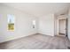 Spacious bedroom with two windows and carpeting at 1111 Joseph Pl, Erie, CO 80026