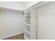 Large closet with shelving and hanging rods for storage at 7455 E Quincy Ave # 101, Denver, CO 80237