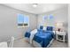 Cozy bedroom with large windows offering great outdoor views and natural light at 22043 E 38Th Pl, Aurora, CO 80019