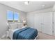 Bright bedroom features a large window and a view of the outdoors, filling the room with natural light at 22043 E 38Th Pl, Aurora, CO 80019