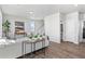 Comfortable living space features neutral tones, stair access, and bright window lighting at 22043 E 38Th Pl, Aurora, CO 80019