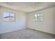 Comfortable carpeted bedroom with natural light and clean white walls at 9270 Tennyson St, Westminster, CO 80031