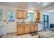 Bright kitchen featuring wooden cabinets, tile countertops, and stainless-steel appliances at 9270 Tennyson St, Westminster, CO 80031