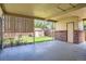 Covered patio area with brick accents overlooking a well-maintained backyard at 9270 Tennyson St, Westminster, CO 80031