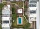 Aerial view of apartment building community showcasing landscaping, courtyard, and pool at 384 S Ironton St # 408, Aurora, CO 80012