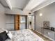 Cozy bedroom showcasing an open closet with storage shelving and ample natural light at 384 S Ironton St # 408, Aurora, CO 80012