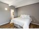 Comfortable bedroom with view into updated en-suite bathroom at 384 S Ironton St # 408, Aurora, CO 80012