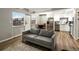 Cozy living room features a comfortable sofa and ample natural light at 384 S Ironton St # 408, Aurora, CO 80012
