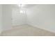Clean, carpeted basement bedroom featuring neutral walls and ample natural light at 3643 S Mobile Way, Aurora, CO 80013
