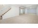 Large basement space with carpet and white painted walls and ceilings at 3643 S Mobile Way, Aurora, CO 80013