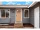 Close-up of the front entrance showing the door number and welcoming entryway at 3643 S Mobile Way, Aurora, CO 80013