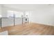 Open-concept living area showcasing hardwood floors and seamless transition to the kitchen at 3643 S Mobile Way, Aurora, CO 80013