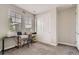 Bright bedroom with a work space, large windows, and ample closet space at 4343 E 96Th Way, Thornton, CO 80229