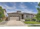 Charming home with stone accents, solar panels, a two-car garage and well maintained lawn at 4343 E 96Th Way, Thornton, CO 80229