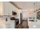 Modern kitchen featuring stainless steel appliances and bright white cabinetry at 4343 E 96Th Way, Thornton, CO 80229