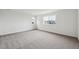 Bright carpeted bedroom with natural light at 5537 Riverbend Ave, Firestone, CO 80504