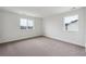 Spacious, carpeted bedroom with great natural light at 5537 Riverbend Ave, Firestone, CO 80504