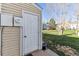 Unit backyard features a storage shed, grassy yard, and neighborhood views at 3121 S Estes St, Lakewood, CO 80227