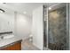Bathroom showcasing tile flooring, a shower with decorative tile surround, and a toilet at 10914 Remmick Ridge Rd, Parker, CO 80134