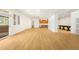 Open-concept living area with hardwood floors, a full kitchen, and bright windows, perfect for entertaining and everyday living at 10914 Remmick Ridge Rd, Parker, CO 80134