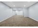 A finished basement offers a versatile living space with neutral carpeting and recessed lighting at 1963 Hogan Ct, Castle Rock, CO 80109