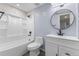 This bathroom offers updated features, fixtures, a shower, and a vanity at 1963 Hogan Ct, Castle Rock, CO 80109
