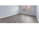 Bedroom featuring vinyl floors and windows, offering natural light at 1963 Hogan Ct, Castle Rock, CO 80109