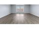 Spacious bedroom with vinyl flooring and plenty of natural light from the windows at 1963 Hogan Ct, Castle Rock, CO 80109