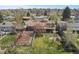 Aerial view of a single-Gathering home featuring fenced yard with garden and brick oven at 3975 S Jason St, Englewood, CO 80110