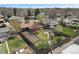 Aerial view of home with manicured lawn, garden, and proximity to neighborhood amenities at 3975 S Jason St, Englewood, CO 80110