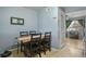 Kitchen and dining area with a view to the living room and front yard at 3975 S Jason St, Englewood, CO 80110