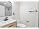 Stylish bathroom featuring a modern vanity with a vessel sink, toilet, and modern fixtures at 12164 E Amherst Cir, Aurora, CO 80014