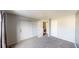Bright bedroom with neutral walls and carpet at 1811 S Quebec Way # 194, Denver, CO 80231