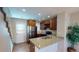 Galley kitchen with granite countertops and stainless steel appliances at 1811 S Quebec Way # 194, Denver, CO 80231