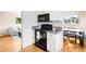 Modern kitchen with stainless steel appliances, granite countertops, and ample cabinet space at 2255 Perry St, Denver, CO 80212