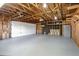 Spacious garage with high ceilings and ample storage at 4720 E Mexico Ave, Denver, CO 80222