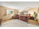 Cozy bedroom with natural light, a comfortable recliner, and a spacious layout at 10433 Red Mountain W, Littleton, CO 80127