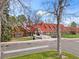 Community clubhouse showcasing traditional architecture with a red roof, offering residents a gathering space at 10433 Red Mountain W, Littleton, CO 80127